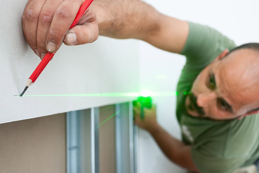 Accurate Site Measurements Accurate site measurements being taken for manufacturing drafting